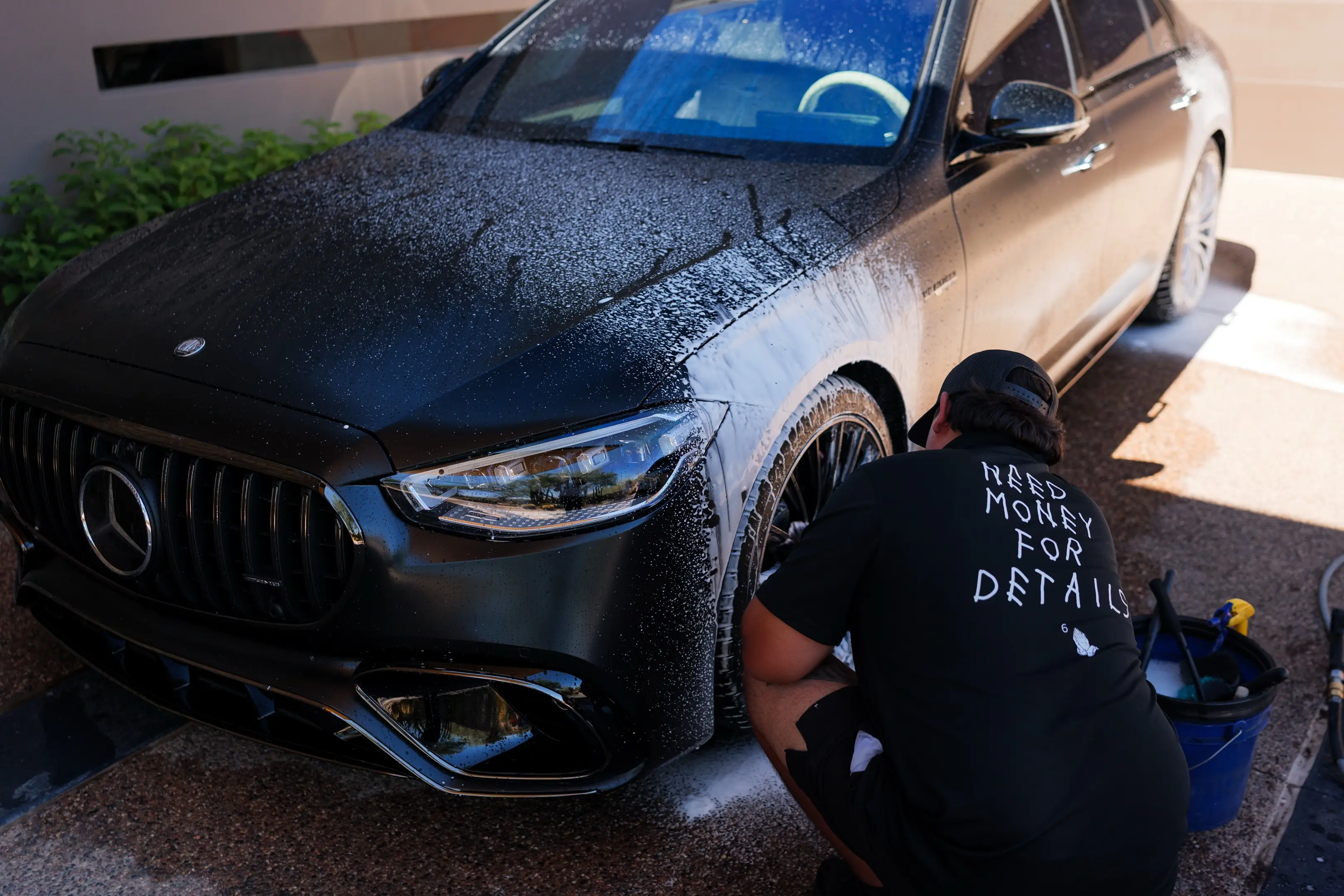 Wheel and exterior detailing on a sports car by Sudz & Shade, the Valley