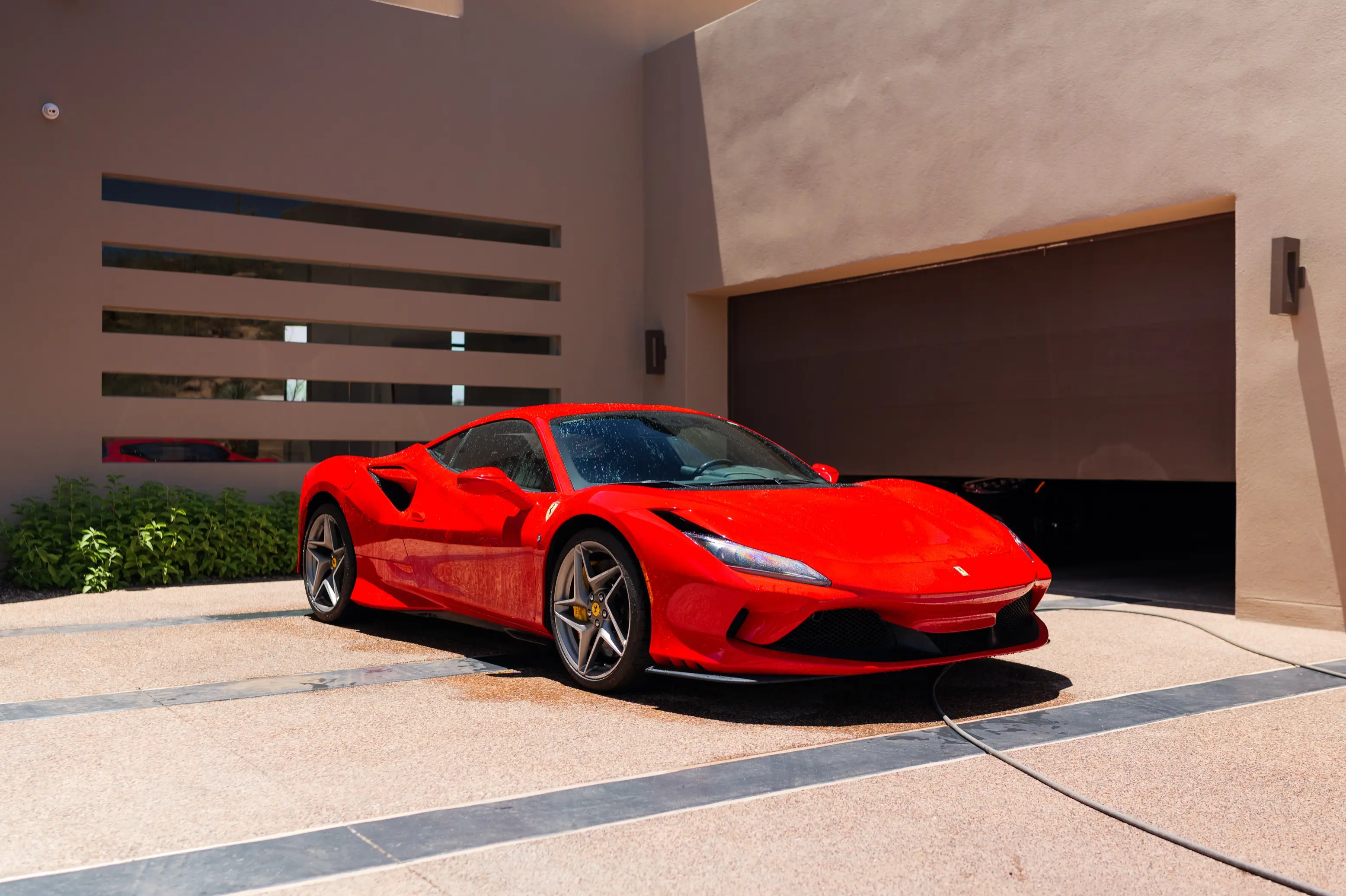 Mobile exterior detailing on a luxury car by Sudz & Shade in the Valley